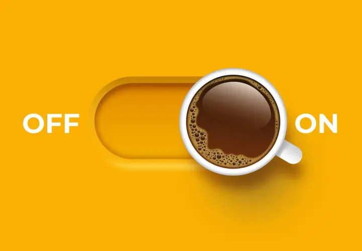 Interruttore "ON" con una tazza di caffè fumante, pronto a dare la carica con la sua caffeina.